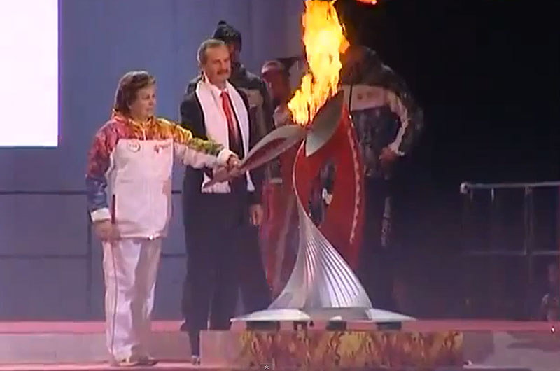 Space-Bound Olympic Torch Heads to Launch Site as Cosmonaut Carries Flame